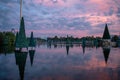 Christmas Trees on lake and Sky Tower on beautiful sunset background at Seaworld 4 Royalty Free Stock Photo