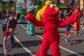 Elmo, Zoe and Big Bird dancing with childs and parents in Sesame Street Party Parade at Seaworld 6.