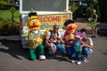 Family taking picture with Bert and Ernie in Sesame Street at Seaworld