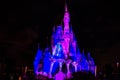 Illuminated and colorful Cinderella Castle in One Upon a Time Show at Magic Kingdom 9.