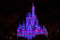 Illuminated and colorful Cinderella Castle in One Upon a Time Show at Magic Kingdom 7.