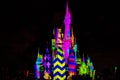 Illuminated and colorful Cinderella Castle in One Upon a Time Show at Magic Kingdom 4.