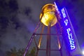 Illuminated Tower and sign of House of Blues at night in Lake Buena Vista.