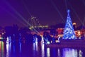 Iluminated Christmas Tree , sky tower and colorful rollercoaster at night in International Drive area. Royalty Free Stock Photo