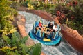 People enjoying ride in Infinity Falls at Seaworld Marine Theme Park. Royalty Free Stock Photo