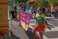 Dancing girls with Happy Halloween sign in Sesame Street Party Parade at Seaworld