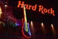 Red Hard Rock cafe sign and colorful guitar in Citywalk Universal Studios. Royalty Free Stock Photo