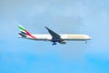 Airplane from Emirates Airlines, is landing at Orlando Airport .The background of the image ma