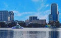 City skyline and colorful water fountain at sunset in Lake Eola Park . 3 Royalty Free Stock Photo