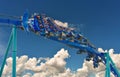 Group of people enjoy a fast Manta Roller coaster at Seaworld Orlando. Royalty Free Stock Photo