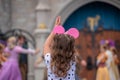 Nice little girl enjoying Mickeys Royal Friendship Faire on Cinderella Castle in Magic Kingdom at Walt Disney World Resort 4