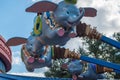 People enjoying Dumbo the Flying Elephant at Magic Kigndom 1