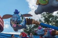 People enjoying Dumbo the Flying Elephant at Magic Kigndom 2