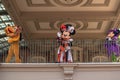 Pluto, Mickey and Minnie Mouse waving from the balcony at Walt Disney World Railroad in Halloween season at Magic Kingdom 2 Royalty Free Stock Photo