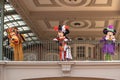 Pluto, Mickey and Minnie Mouse waving from the balcony at Walt Disney World Railroad in Halloween season at Magic Kingdom 3 Royalty Free Stock Photo