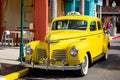 Orlando, USA - Feb. 12, 2021: Vintage yellow cab taxi parked along the street Royalty Free Stock Photo