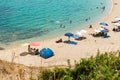 Ormos Panagias, Greece, 29/06/2019: Warm summer day on the beach by the sea