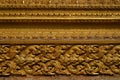 Ornament detail golden pattern stucco of Thailand style texture background from temple