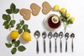 Ornament of lemons, cookies and rose leaves on white background. Recipe of gingerbread Royalty Free Stock Photo