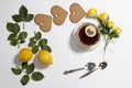 Ornament of lemons, cookies and rose leaves on white background. Recipe of gingerbread Royalty Free Stock Photo