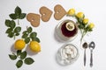 Ornament of lemons, cookies and rose leaves on white background. Recipe of gingerbread Royalty Free Stock Photo