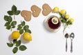 Ornament of lemons, cookies and rose leaves on white background. Recipe of gingerbread Royalty Free Stock Photo