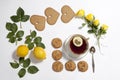 Ornament of lemons, cookies and rose leaves on white background. Recipe of gingerbread Royalty Free Stock Photo