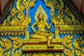 Ornament on walls and door in the buddhist temple wat in Thailand