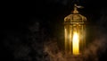 Ornamental Arabic lantern with burning candle glowing