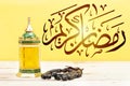 Ornamental Arabic lantern oud perfume with black rosary, Ramadan Kareem Greeting Card. Ramadan Mubarak. Translated: Happy & Holy R Royalty Free Stock Photo