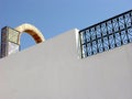 Ornamental arch on roof top terrace in Tunisia Royalty Free Stock Photo