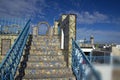 Ornamental arches and stairs on roof top terrace in Tunisia Royalty Free Stock Photo