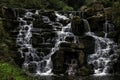 Ornamental cascade waterfall in Virginia Water, Surrey, UK Royalty Free Stock Photo