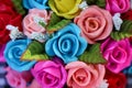 Ornamental colorful flowers miniature clay roses texture , nature patterns for background