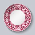 Ornamental dish with red pattern in the style of ethnic porcelain painting. Empty Space for text in the center.