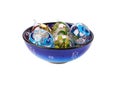 Ornamental eggs from glass in blue cap.