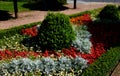 Ornamental flowerbed in front of the castle on the ground floor. The planting of annuals is in the shape of a circle with a moon s