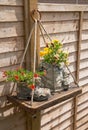 Ornamental garden shelf with decorative planters Royalty Free Stock Photo