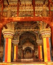 Ornamental king sarafoji siting doom and pillars in ministry hall- dharbar hall- of the thanjavur maratha palace Royalty Free Stock Photo