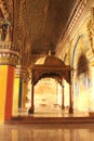 Ornamental king sarafoji siting doom and pillars in ministry hall- dharbar hall- of the thanjavur maratha palace Royalty Free Stock Photo