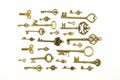 Ornamental medieval vintage keys with intricate forging, composed of fleur-de-lis elements, victorian leaf scrolls and heart shape Royalty Free Stock Photo