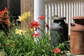 Ornamental milk urns on porch of country home Royalty Free Stock Photo