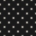 Ornamental seamless pattern with small cross shapes, stars. Dark luxury texture