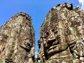 Ornamental statues in the shape of faces in Bayon Temple, Siem Reap, Cambodia. Royalty Free Stock Photo