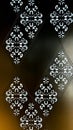 Ornamental Wall Panel With Backlit Cut-Out Patterns, Close-Up Of Decorative Geometric Design, Royalty Free Stock Photo