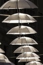 Ornamental white umbrellas in town