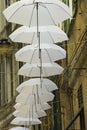 Ornamental white umbrellas in town