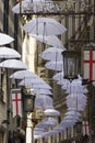 Ornamental white umbrellas in town