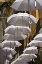 Ornamental white umbrellas in town