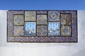 Ornamental windows on roof top terrace in Tunisia Royalty Free Stock Photo